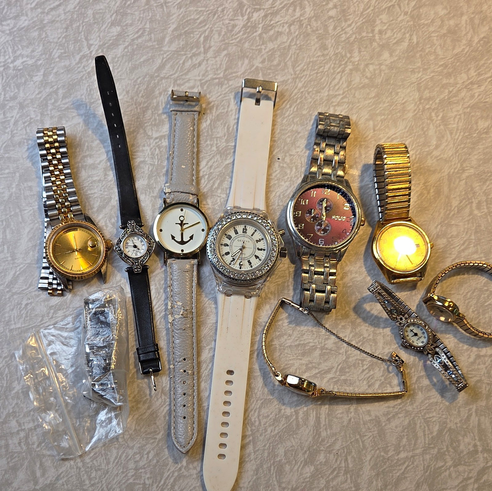 Lot of 10 Watches broken for parts only. No Guarantee